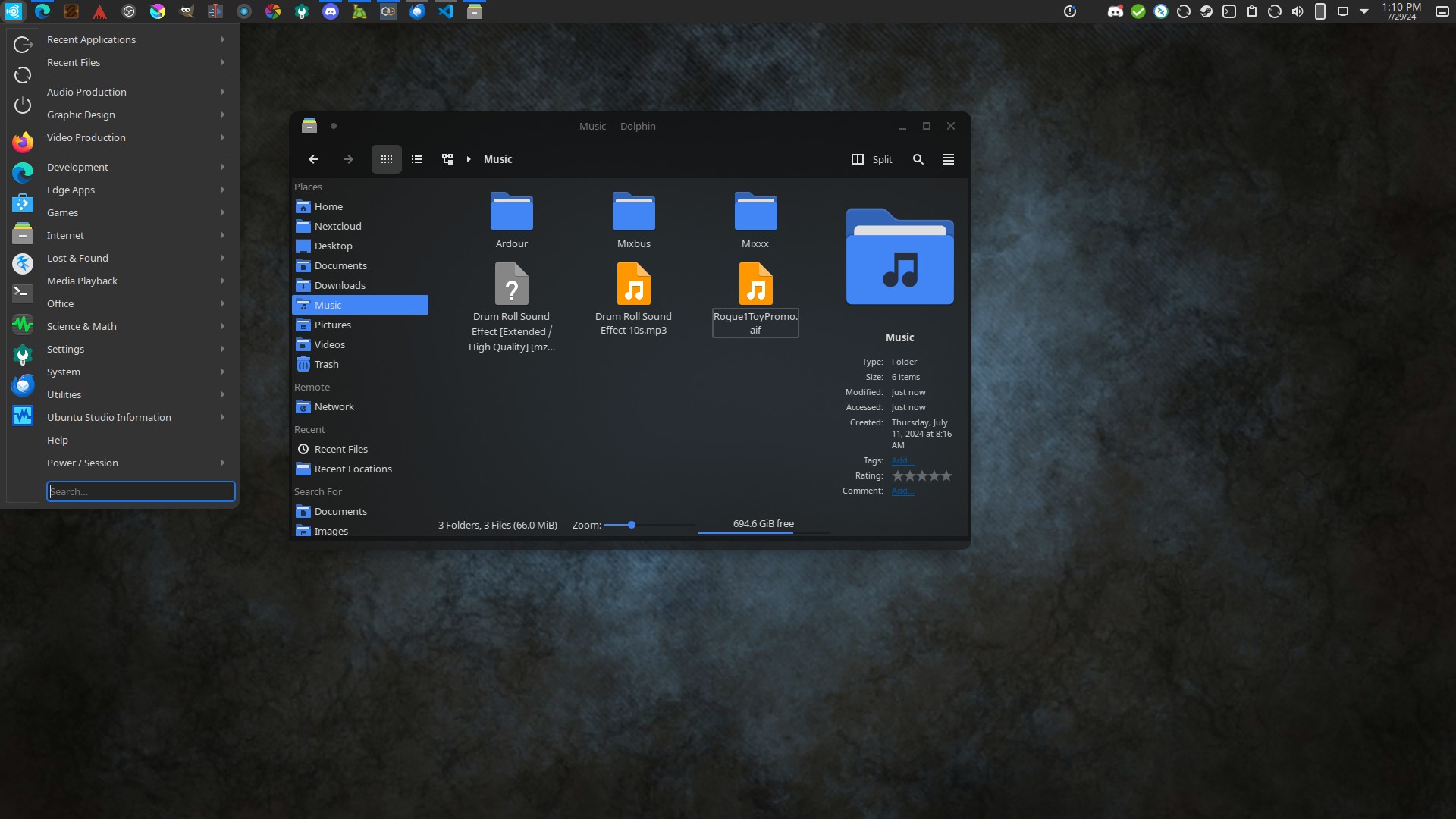 Screenshot of the Dolphin file manager displaying the Music directory, showing various audio files and folders.